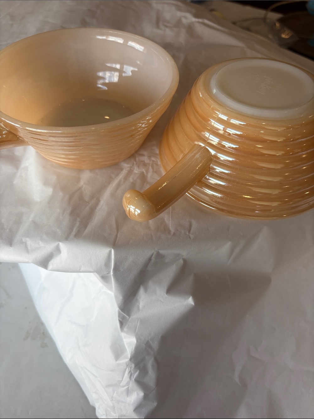 Fire king peach luster ovenware handled soup bowl